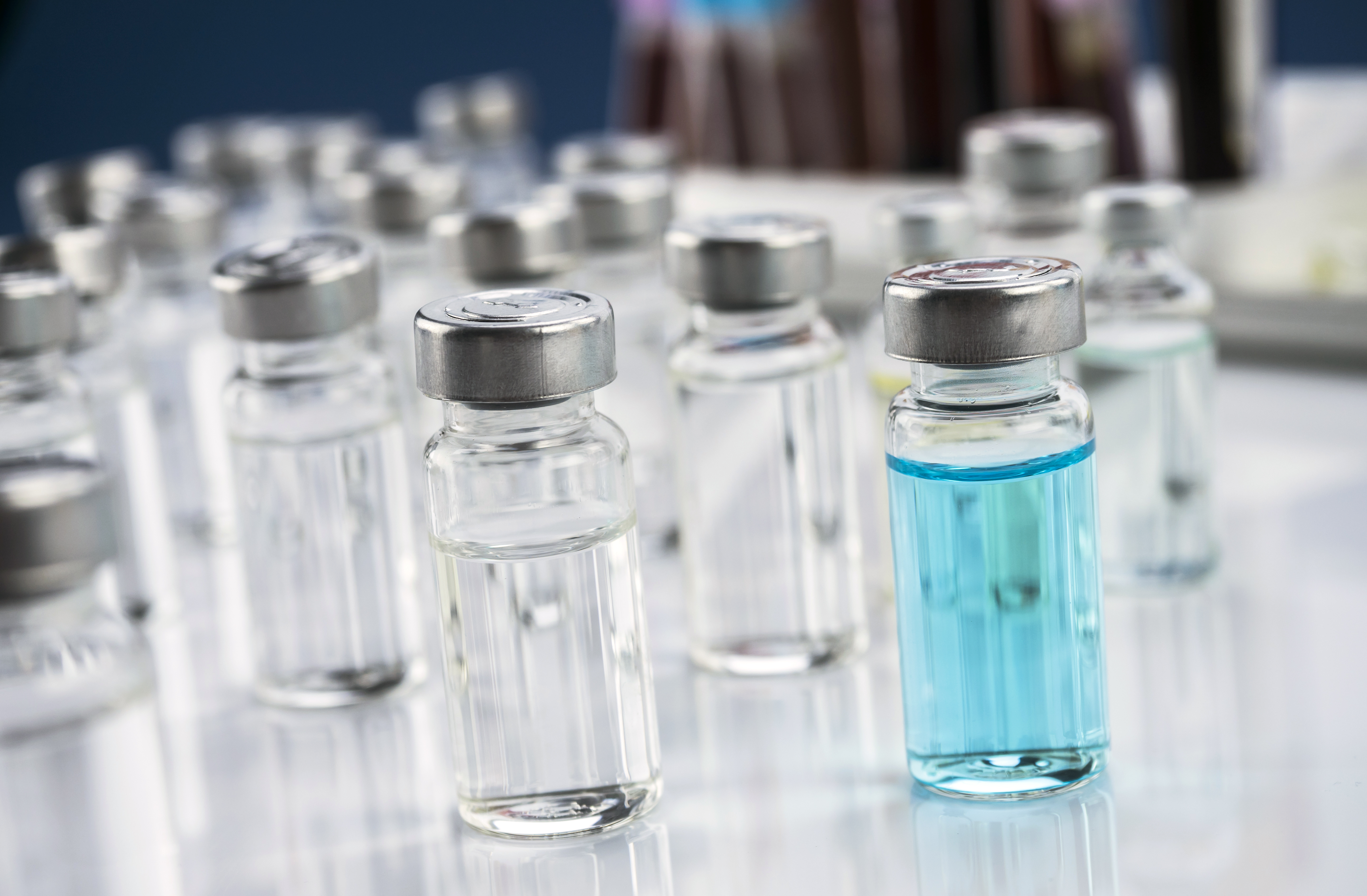 Several vials with medication, conceptual image